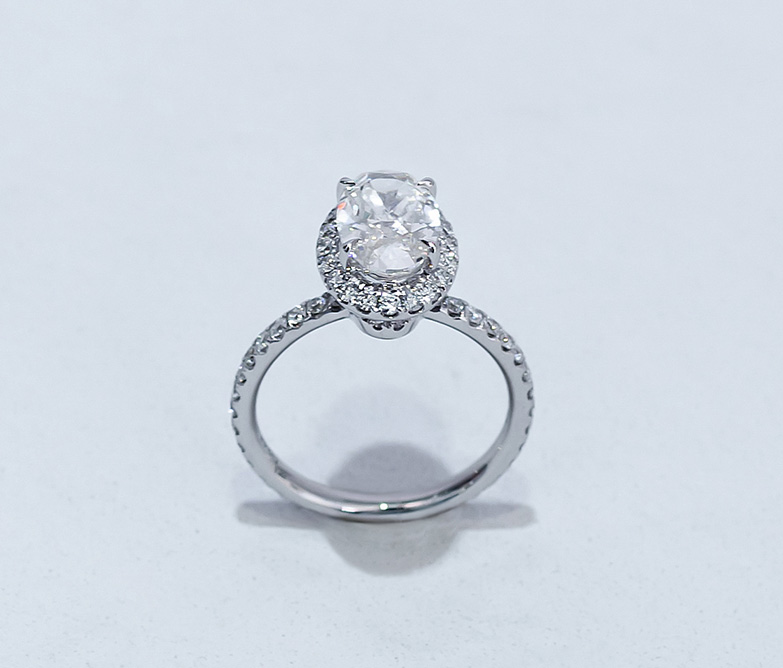 Oval Halo Three-quarter Coverage Diamond Engagement Ring